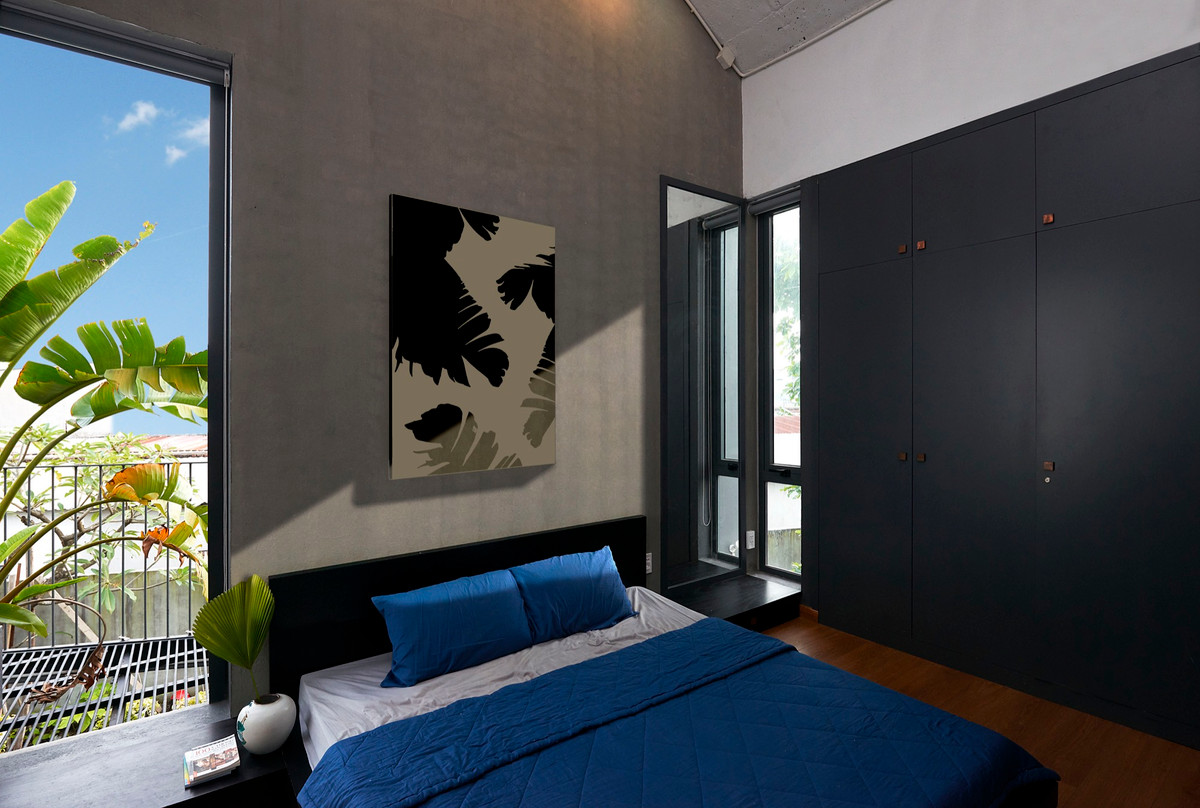 Phòng ngủ bài trí đơn giản. Nội thất được tiết chế tối đa nhằm gia tăng diện tích cho căn phòng.