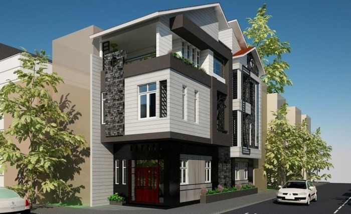 Gam màu tối chủ đạo kết hợp mảng tường trắng xen kẽ giúp ngôi nhà 3 tầng nổi bật so với các công trình xung quanh. Ảnh: Banvenhadep.