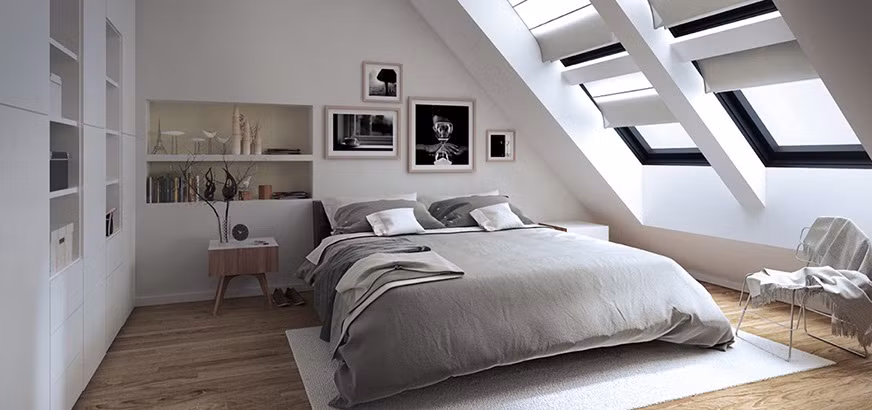 Không gian gác mái như được mở rộng hơn với cửa sổ lớn ngập tràn ánh sáng.