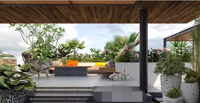 Chậu cây xanh mát, đan xen cùng những bông hoa đua nhau khoe sắc.