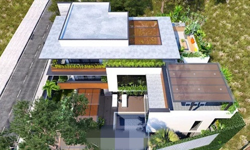 Sân vườn vui chơi ngoài trời được thiết kế tại tầng thượng của căn biệt thự hiện đại.