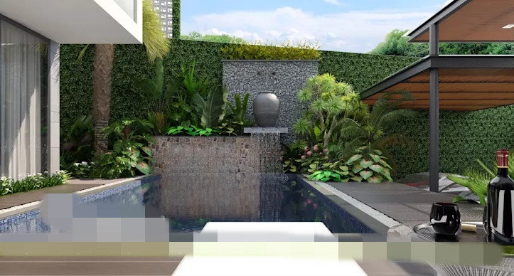 Bể bơi ngoài trời được bao quanh bởi hệ thống cây xanh đa dạng.