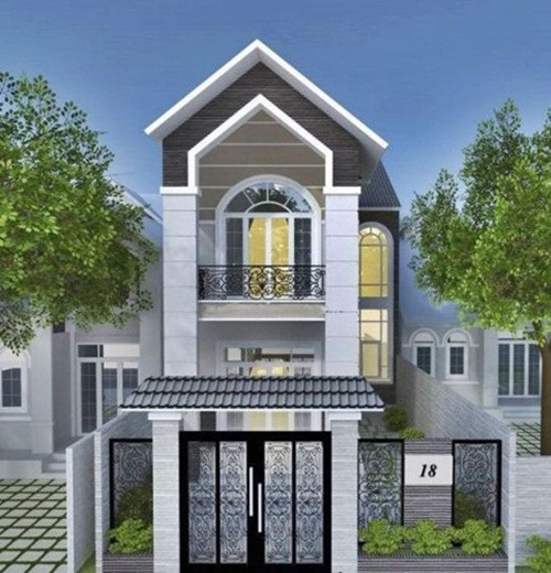 Nhà phố mái thái nổi bật với họa tiết ở lan can sắt và cổng ra vào. Ảnh: Nhabinhduong.