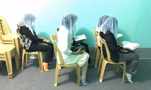 Những người tham gia "Hội thánh đức chúa trời" đang rao giảng (Ảnh Công an huyện Ngọc Lặc)