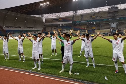 Sau khi giành chiến thắng Olympic Nhật Bản với tỷ số 1-0, đội tuyển Olympic Việt Nam giành trọn 9 điểm và cán đích ở vị trí số một bảng D tại ASIAD 2018. Ảnh: VOV.