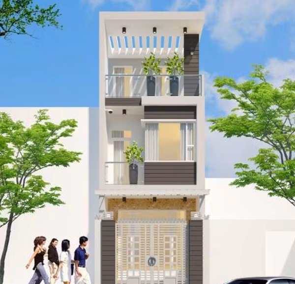 Nhà 3 tầng thanh thoát, được nhấn nhá thêm đá hoa cương nhân tạo màu vàng ở mặt tiền. Ảnh: Em đẹp.