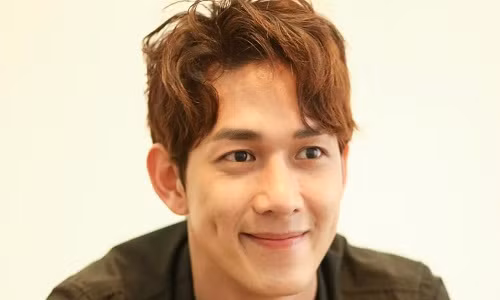 Nam ca sĩ - diễn viên Song Luân.