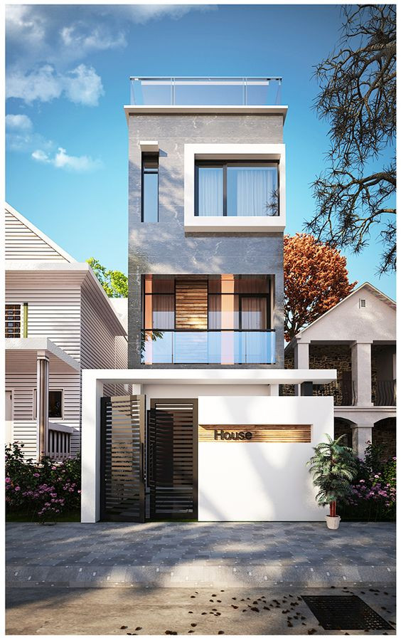 Nhà phố 3 tầng 60m2 có tạo hình đẹp mắt với một cánh cổng nhỏ, một hàng rào đơn giản nhưng không đơn điệu. Ảnh: Kientrucnhadep24h.