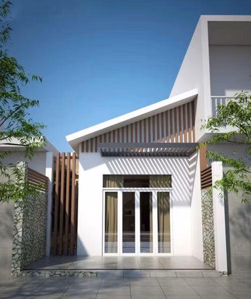 Mẫu nhà cấp 4 mái tôn thiết kế khá đơn giản. Phần mái lệch giúp che đi phần mái tôn của căn nhà, đồng thời mang lại nét đẹp cho công trình. Ảnh: Vtkong.