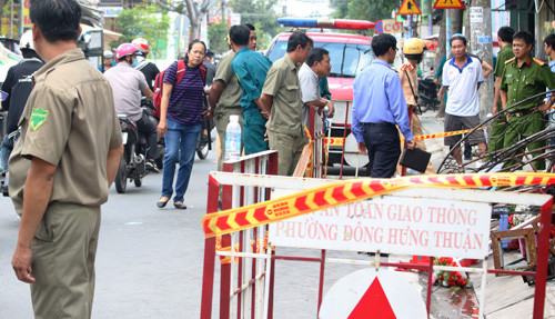 Cơ quan chức năng phong toả hiện trường vụ cahy1 làm 3 người tử vong.
