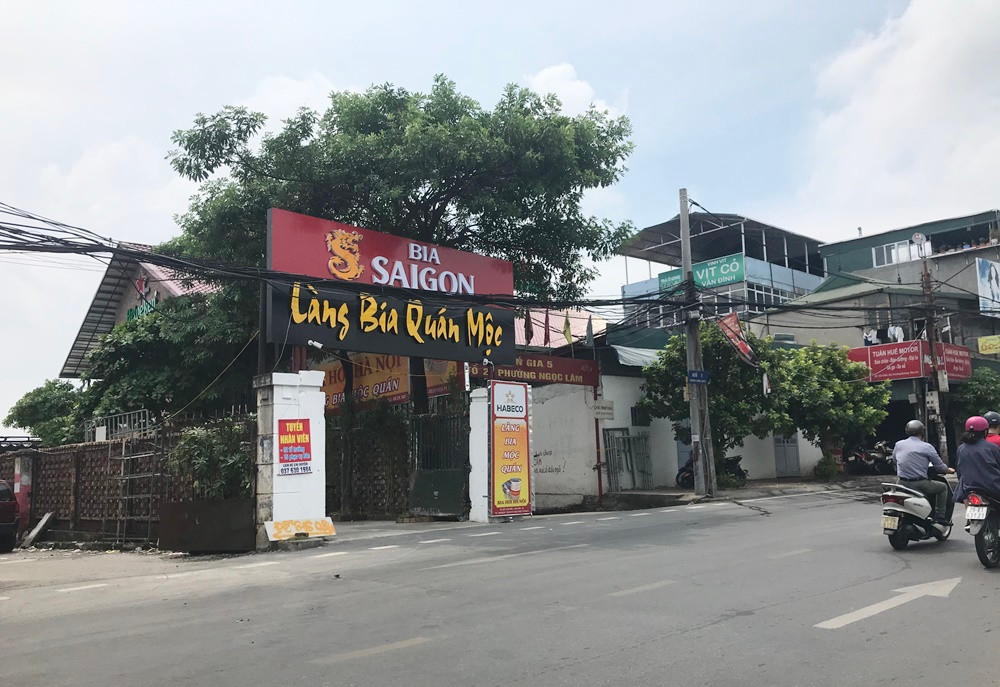 Tan muc quan nhau “qua mat” phuong xay lan chiem hanh lang thoat lu song Hong