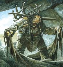 Khuôn mặt của Qalupalik trông giống như một phụ nữ nhưng nhanh chóng chuyển sang màu xanh lá cây với nhiều nốt sưng phồng.