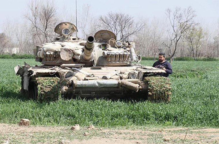 “Lực lượng chính phủ Damascus đã giành quyền kiểm soát 59% Đông Ghouta sau 13 ngày giao tranh ác liệt với khủng bố”, Cơ quan Giám sát Nhân quyền Syria (SOHR) cho biết. Ảnh: FNA.