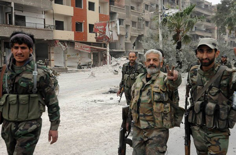 “Lực lượng chính phủ Damascus đã được triển khai tới các vị trí trong khu vực và sẵn sàng tấn công thị trấn Douma”, nguồn tin cho biết. Ảnh: FNA.