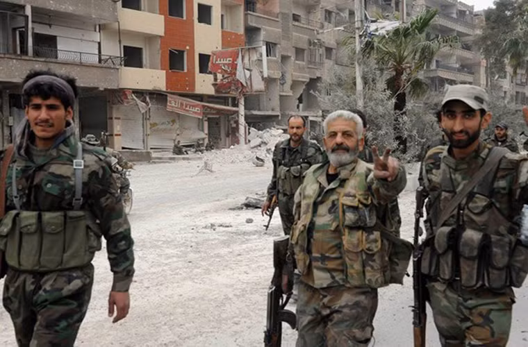 “Lực lượng chính phủ Damascus đã được triển khai tới các vị trí trong khu vực và sẵn sàng tấn công thị trấn Douma”, nguồn tin cho biết. Ảnh: FNA.