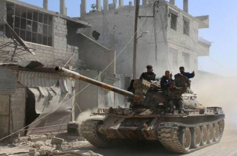 Theo truyền thông Hezbollah, lực lượng chính phủ Damascus đã chiếm được hơn 70% khu vực Ayn Tarma. Ngoài ra, các binh sĩ Syria cũng giải phóng nhiều khu vực rộng lớn của thị trấn Hazeh. Ảnh: FNA.