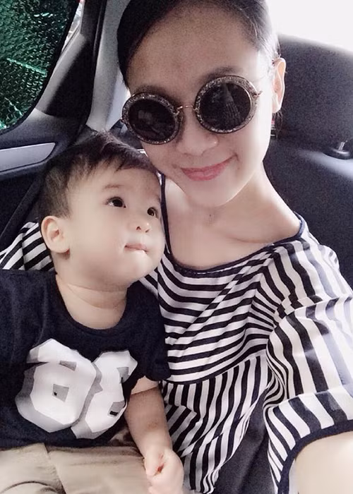 Bé trai xuất hiện bên Thái Hà thực tế là con nuôi của nữ người mẫu. Ảnh: Đại lộ