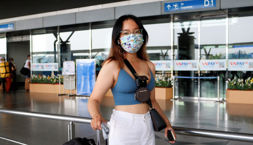Ga quoc te Tan Son Nhat dan dong khach di du lich nuoc ngoai-Hinh-4