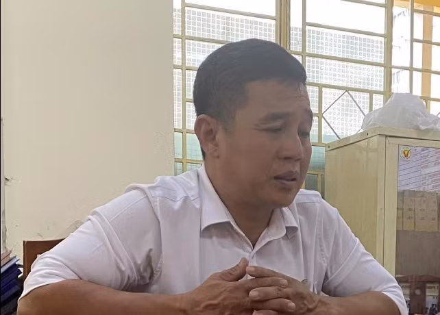 Nguoi dan ong tron truy na, thay ten doi ho bi bat sau 23 nam