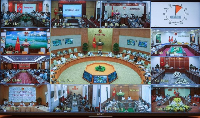 Thu tuong chu tri phien hop Chinh phu thuong ky thang 3 va Hoi nghi truc tuyen voi dia phuong-Hinh-2