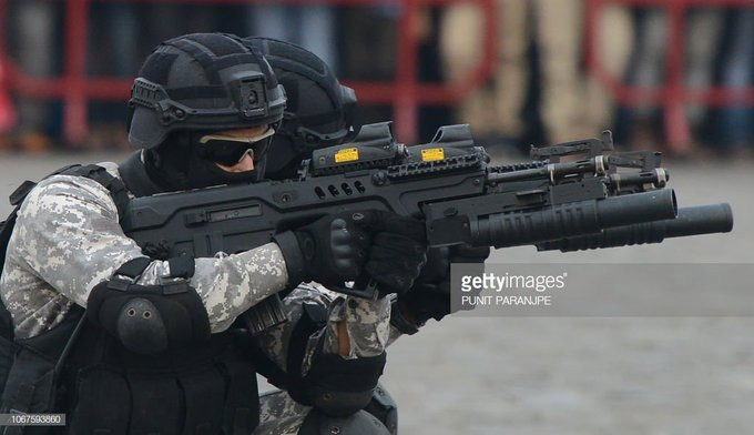 Tiền tố "G" thêm vào tên gọi của TAR-21 thể hiện đây là phiên bản có khả năng sử dụng cùng với súng phóng lựu (Grenade Launcher), giống với phiên bản CTAR-21 là bản thu nhỏ (Compact) hay STAR-21 là bản súng bắn tỉa (Sniper). Nguồn ảnh: Gettyimg.