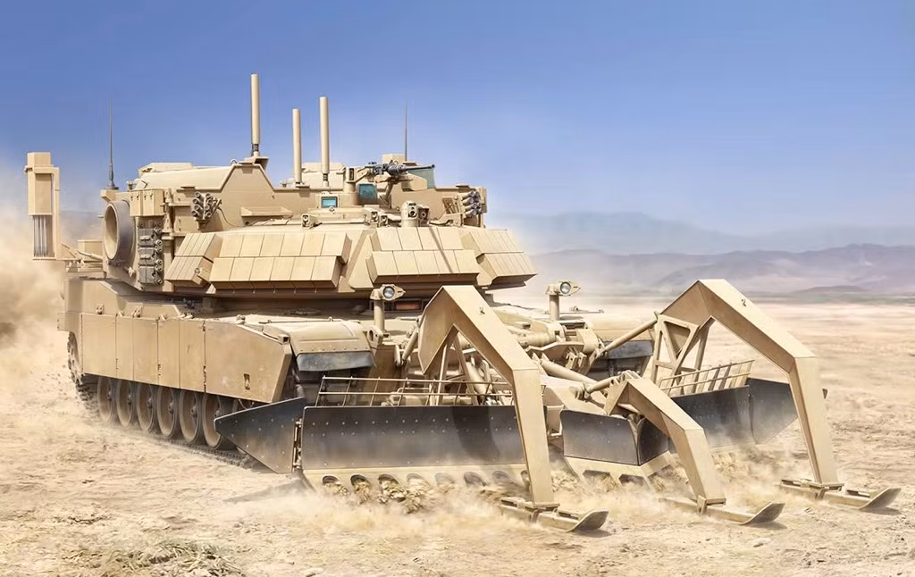 Để làm được công việc này, M1155 được trang bị một gầu xúc hạng nặng kèm theo nhiều chân tác động lực. Mọi quả mìn nếu không bị các chân chịu lực kích hoạt đều sẽ bị xới tung lên mặt đất bằng chiếc gầu xúc. Nguồn ảnh: Pinterest.