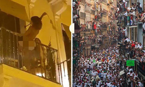 Cô gái khỏa thân nhảy nhót trên ban công ở Tây Ban Nha trong lễ hội bò tót.