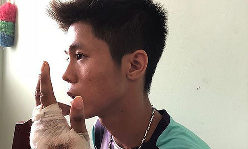 Nguyễn Hữu Tình tại cơ quan công an. Ảnh: CA