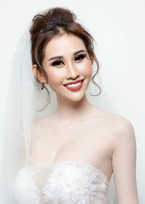 Hình ảnh Chi Nguyễn mặc váy cô dâu trong một bộ ảnh thời trang.