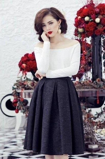 Váy xòe cũng là trang phục cho các nàng vòng 3 quá khổ có thể tự tin khi đi làm cũng như đi chơi.