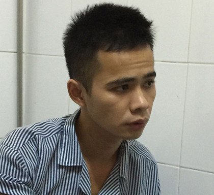 Bế Ích Thi, nghi phạm vụ làm chết người rồi chặt xác phi tang ở Cao Bằng sau khi bị bắt giữ tại cơ quan công an - Ảnh: CAND