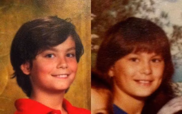  Bố và con trai với nụ cười “sao y bản chính”. 