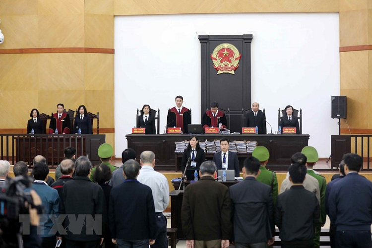 Quá trình điều tra, 20/21 bị cáo thừa nhận sai phạm. Riêng Phan Văn Anh Vũ không thừa nhận hành vi phạm tội. Ảnh: TTXVN. 
