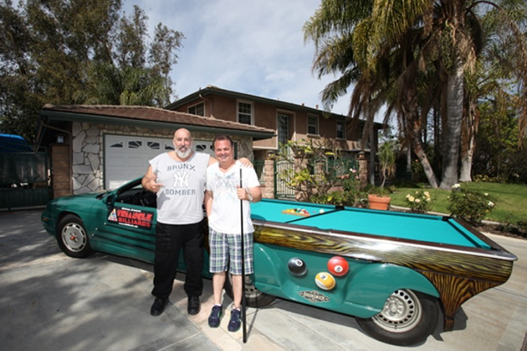 Joe Fiscella là chủ của cửa hàng Triangle Billiards and Bar Stools, nơi bán nhiều dạng bàn bi-a và phụ kiện khác nhau. Hồi năm 2011, trong một lần nói chuyện với bạn về việc tham gia vào một sự kiện chơi bi-a vì mục đích từ thiện, anh ấy nói đùa rằng sẽ nghĩ ra cách để đưa bộ môn thể thao này lên đường phố. Sau đó, Fiscella nảy ra ý tưởng một chiếc xe ôtô kiêm bàn bi-a mà vừa có thể phục vụ mục đích quảng cáo kinh doanh, vừa cung cấp cơ hội vui chơi cho mọi người.