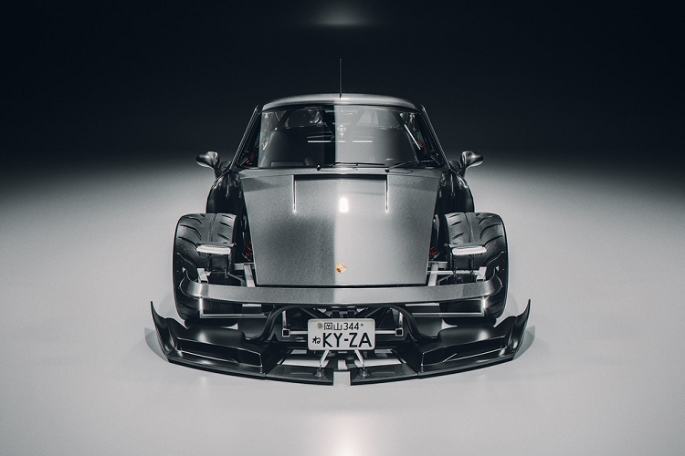 Nhìn từ phía trước, khó lòng nhận ra mẫu xe trong ảnh là Porsche 911 khi 2 bóng đèn chiếu sáng hình tròn đặc trưng đã biến mất. Thay vào đó, nhà thiết kế người Anh mang đến cụm đèn LED nhỏ gọn, cản trước theo phong cách xe đua và loại bỏ phần chắn bùn của 2 bánh trước.