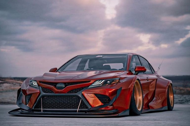 Cuối cùng, những chi tiết nhỏ bé như huy hiệu gắn đuôi cũng được sơn đen tỉ mỉ, tăng thêm phần cá tính cho tổng thể đỏ - đen trên phiên bản Toyota Camry từ Brad Builds này.