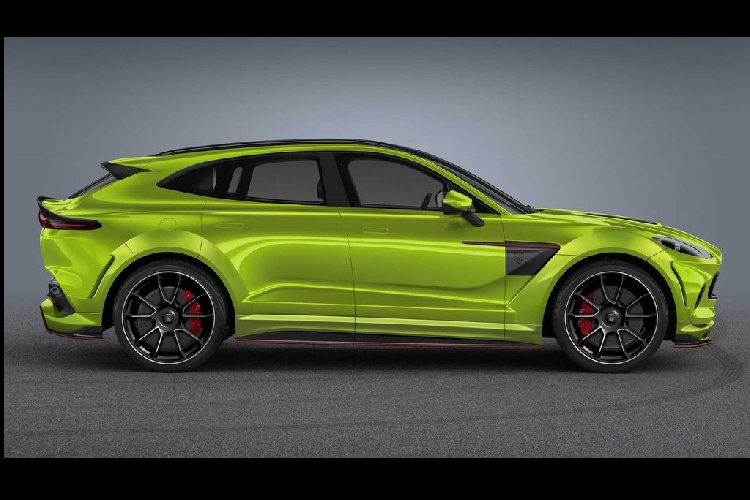 Bắt đầu ở mặt trước, bộ kit này mang tới một bộ cản trước sửa đổi với tấm chia gió mới, các khe hút gió trên nắp capo và đường viền lưới tản nhiệt sơn màu tương phản, tất cả đều được làm từ sợi carbon. Sang tới phía bên, DBX xuất hiện với các vây mới, kết nối các vòm bánh xe để hoàn thiện 1 vẻ đẹp cơ bắp cho chiếc crossover.