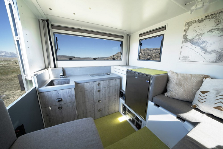 Scott gọi sản phẩm của mình là Adrift. Về bản chất, nó là một chiếc Ford F-550 mà được biến đổi thành một chiếc overlander độ với khoang cabin lớn đặt trên thùng xe phía sau. Trong cabin là lắp đặt đầy đủ những tính năng tiện nghi không thể tìm thấy trong một chiếc RV thông thường. Anh ấy đã tới 5 năm để hoàn thành Adrift, nhưng giờ đây anh ấy đang rao bán nó. Giá xe Ford F-550 Adrift là 225.000 USD (tương đương 5,2 tỷ đồng) bởi vì anh muốn bắt tay làm một dự án khác.