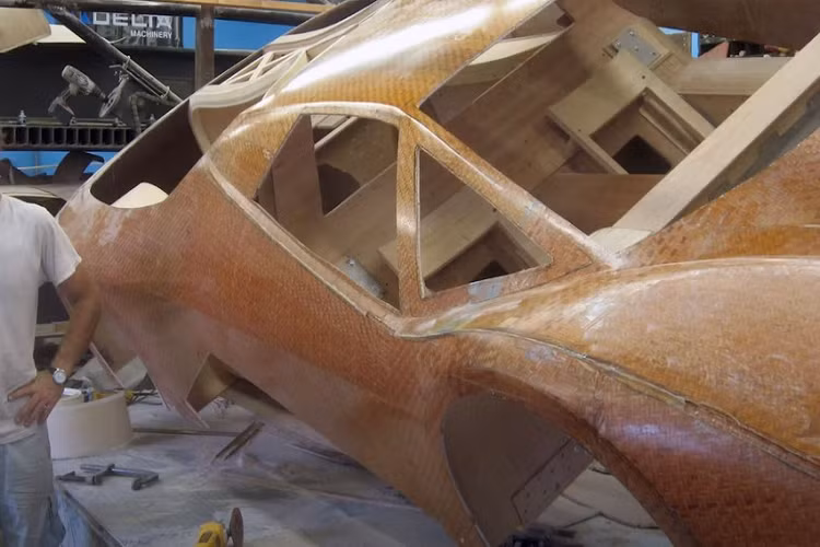 Khi còn là sinh viên đại học tại Đại học Bang North Carolina, Harmon cuối cùng đã có thể đào sâu nghiên cứu về dự án độc đáo này. Harmon có ghi nhận công lao của cha mình bởi ông ấy là người lo liệu tất cả học phí, do đó anh ấy không phải đi làm thêm để trang trải. Thay vào đó, Harmon chỉ tập trung vào ý tưởng của mình, mà anh ấy hình dung như một nghiên cứu về khả năng sử dụng gỗ trong ngành công nghiệp ôtô.