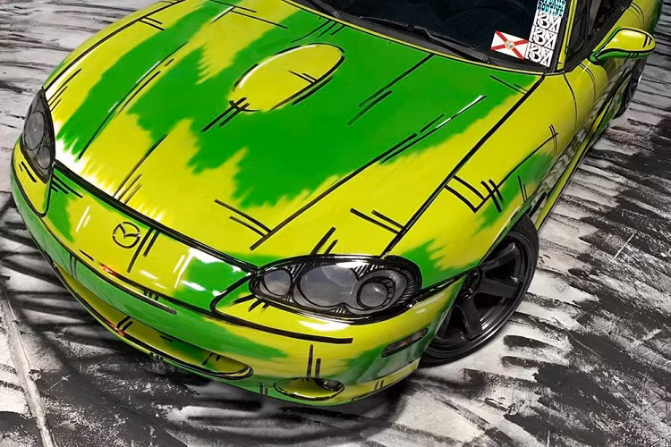 Trong một bài viết đăng trên Facebook, KBMER cho biết rằng trang Animauto trên Instagram chính là nguồn cảm hứng đằng sau chiếc MX-5. Cụ thể hơn, Animauto chuyên đăng tải hình ảnh mô hình xe Nhật Bản tuyệt vời kích thước 1/24 như Subaru WRX STI và Toyota Supra thế hệ thứ 4. Chiếc Miata của Monteiro là dựa trên thế hệ thứ hai, vốn được sản xuất cho tới năm 2005.