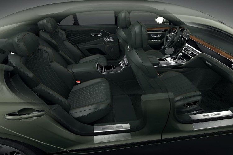 Ở bệ tì tay này, Bentley sẽ bổ sung thêm hai chỗ để cốc, cổng sạc 12V cũng như khoang để đồ, giá treo màn hình mới. Hành khách ở ghế sau giờ đây cũng có thể lựa chọn thêm bộ bàn pinic ốp gỗ veneer, đặt tại lưng ghế trước và có thể được kích hoạt hoàn toàn bằng điện.