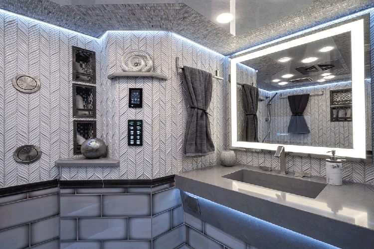 Trong khi đó, phòng tắm chính cũng không kém phần long trọng. Tính năng làm mờ kính, các chế độ nước hoặc hơi nước, nhiệt độ và hệ thống âm thanh đều có thể điều khiển dễ dàng bằng mấy cái quẹt tay trên một màn hình cảm ứng. Không những có trang bị như một spa thu nhỏ, phòng tắm cũng có trang bị thêm các màn hình LED để người dùng giải trí.