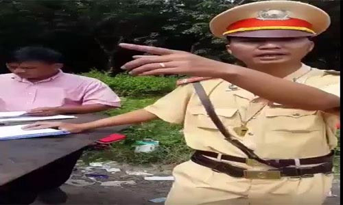 Thieu nu dap moi vi doi CSGT giai thich bi de doa tra thu?-Hinh-2