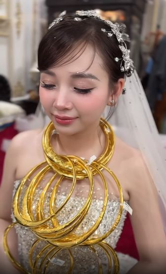 Đoạn video cô dâu xinh đẹp trong ngày cưới hiện thu hút hàng triệu lượt xem trên mạng xã hội. (Ảnh: Chau Toc Nau)