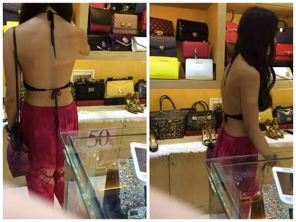 Cô gái này xuất hiện tại một tiệm thời trang với chiếc áo không thể "mát mẻ" hơn. Ảnh: Tổng hợp