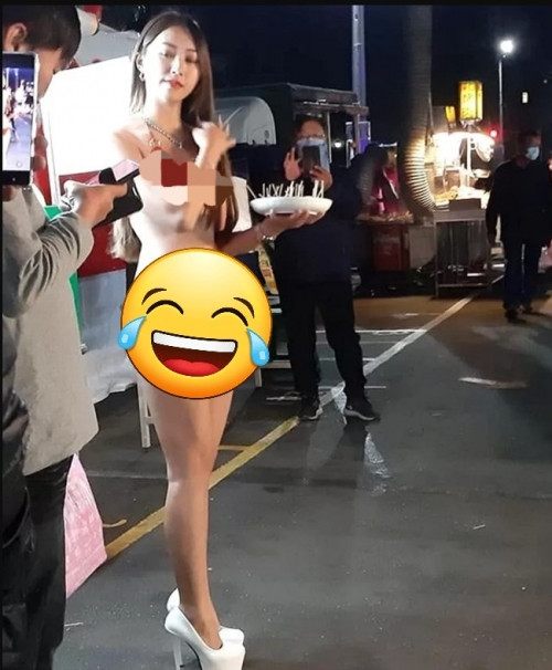 Hình ảnh cô gái đến từ Đài Loan ăn mặc hở hang cụ thể là bikini đứng bán ổi dưới thời tiết 9 độ C từng được netizen truyền tay nhau.