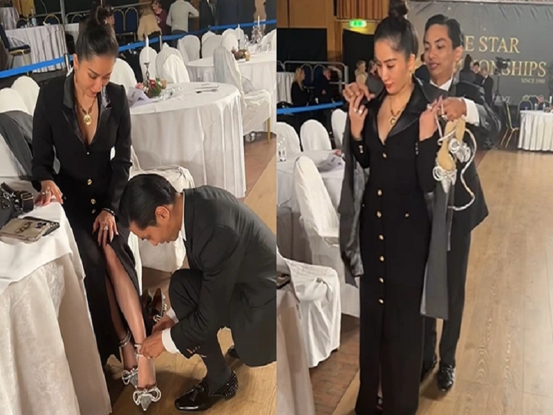 Mới đây, Phan Hiển đăng tải video ghi lại cảnh thay giày cao gót thành giày đế thấp cho bà xã Khánh Thi đang mang thai. Ảnh: Dân Trí