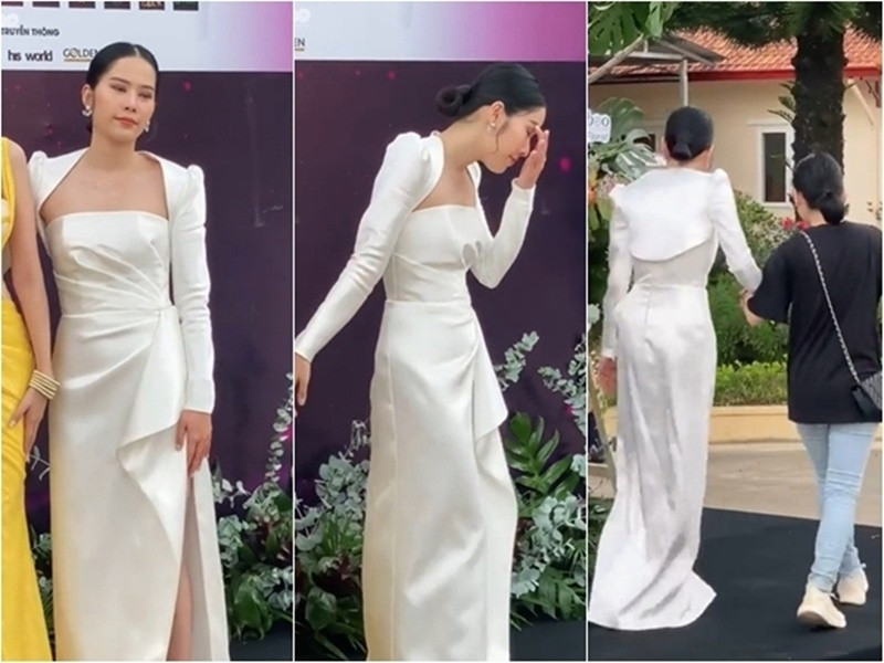 Năm 2021, người đẹp bị choáng, đứng không vững nên được dìu khỏi thảm đỏ một sự kiện. Ảnh: Đời sống pháp luật