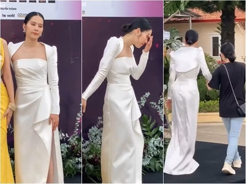 Năm 2021, người đẹp bị choáng, đứng không vững nên được dìu khỏi thảm đỏ một sự kiện. Ảnh: Đời sống pháp luật