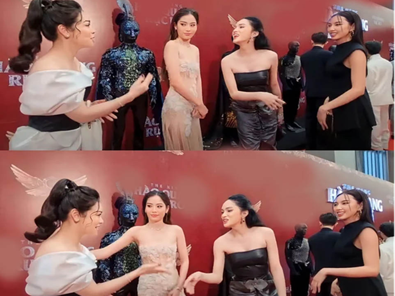 Cách đây không lâu, Hương Giang cũng vướng ồn ào. Khi tham gia sự kiện, cô bất ngờ kéo tay Hoa hậu Thùy Tiên để lên chụp ảnh cùng, “vượt mặt” Nhật Kim Anh và Lệ Nam. Hành động của Hương Giang bị chỉ trích kém duyên dù Nhật Kim Anh và Lệ Nam đồng ý cho Thùy Tiên chen hàng. Ảnh: Người đưa tin